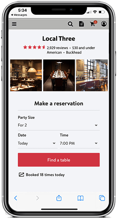 Image of phone with website for making reservations on it